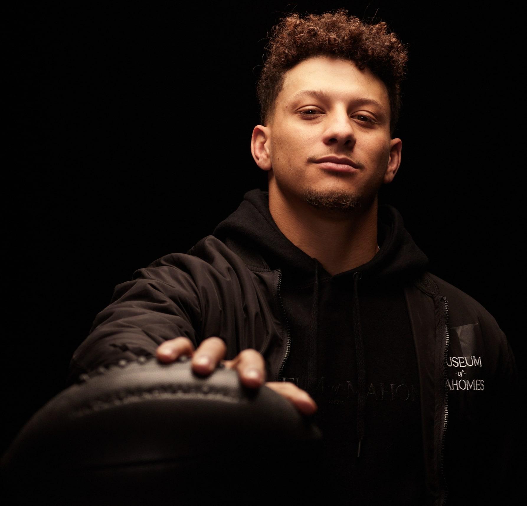 Patrick Mahomes holding a football